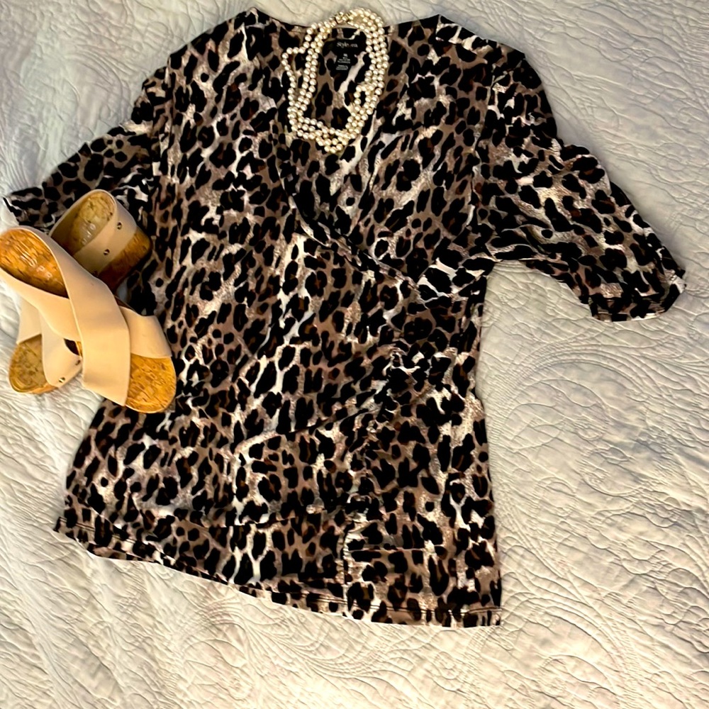 Animal print stretch v-neck blouse in earth tones